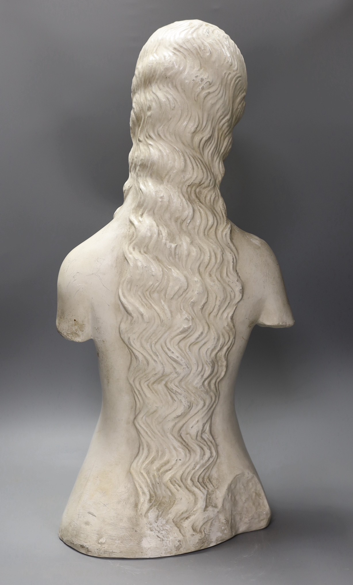 A French plaster bust of a girl, 58 cms high